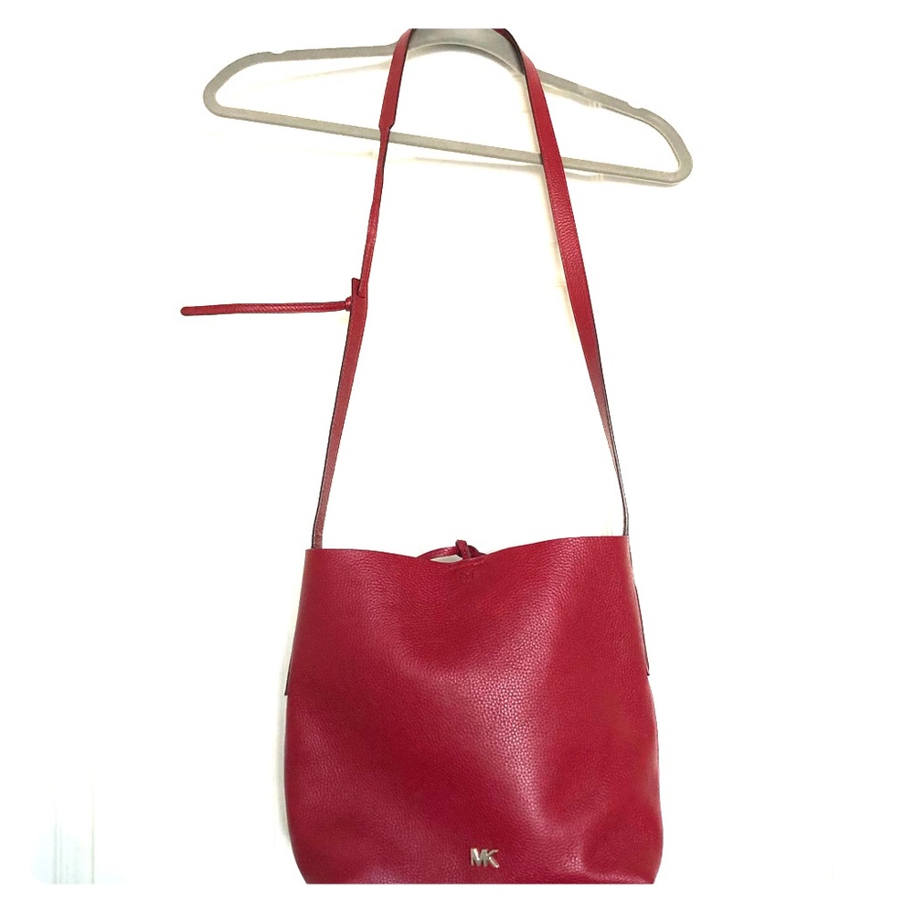 Michael Kors deep red leather crossbody purse.